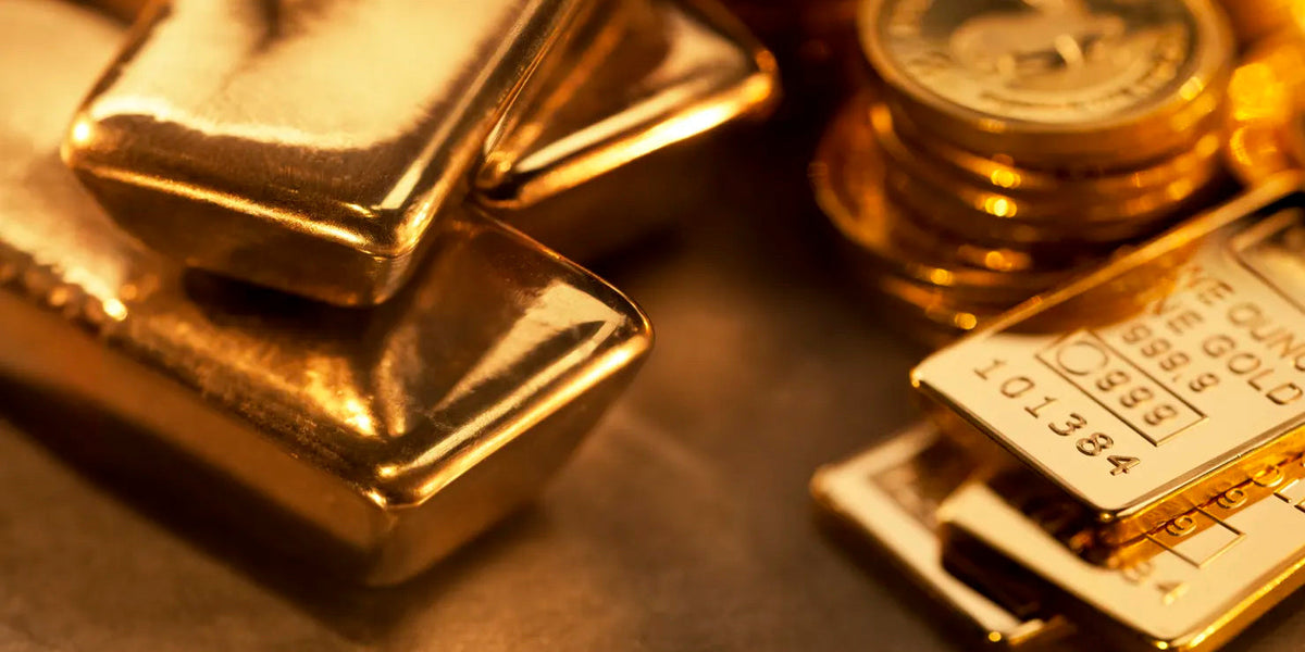 Safe-haven gold touches 2-week peak on trade tensions, rate cut hopes